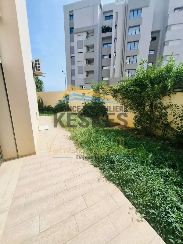 Appartement S+2 avec Jardin Ennasr 2